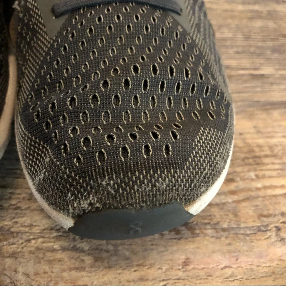 On cloud tennis shoes used condition.  Has some holes,pictures& slits on bottom